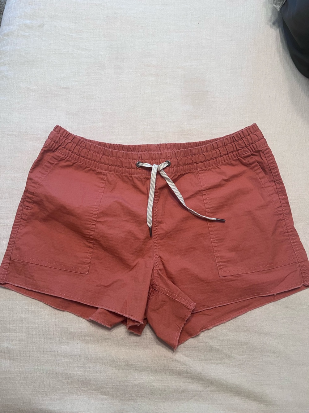 Vuori Women’s Drawstring Swim/Active Shorts in Rust Red